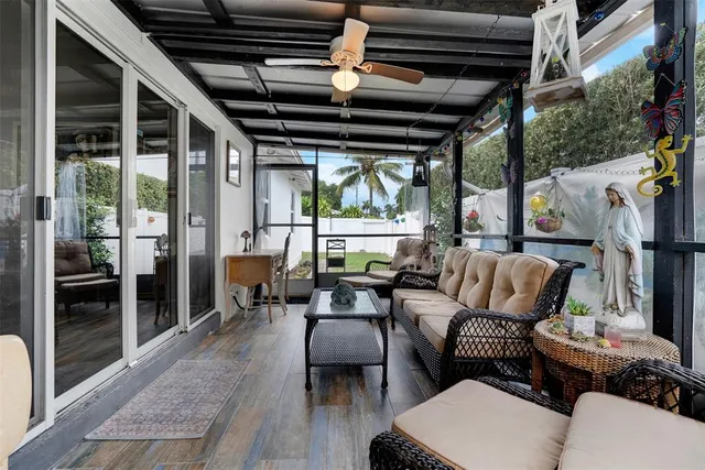 a outdoor living space with furniture and a fireplace