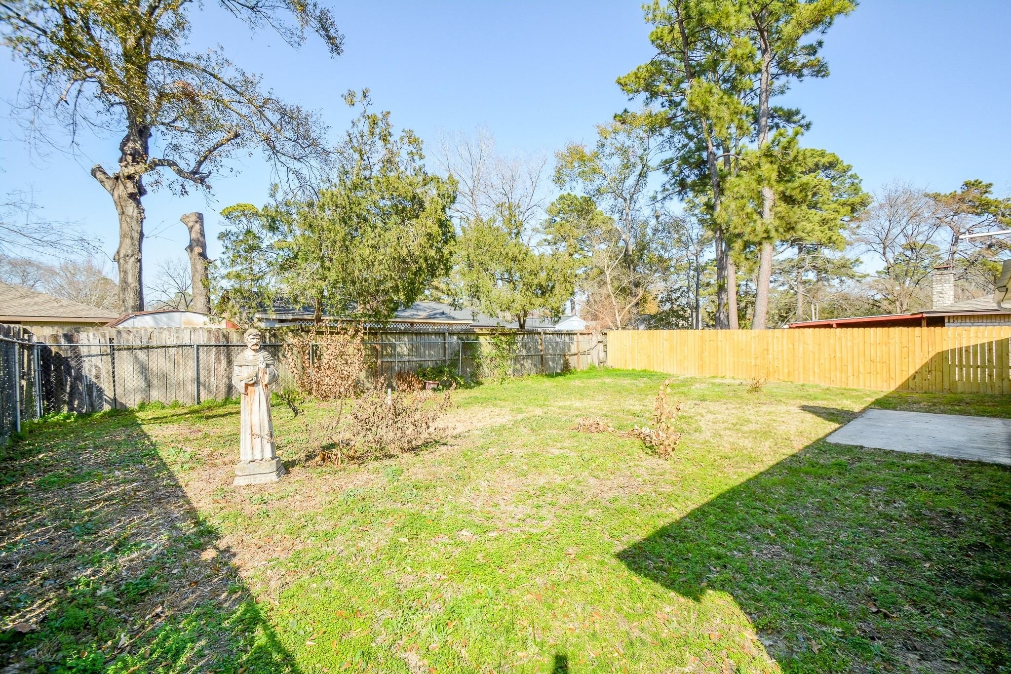 4307 Sloangate Drive Spring, TX 77373 - Photo 20 of 22 a view of a yard with an outdoor space