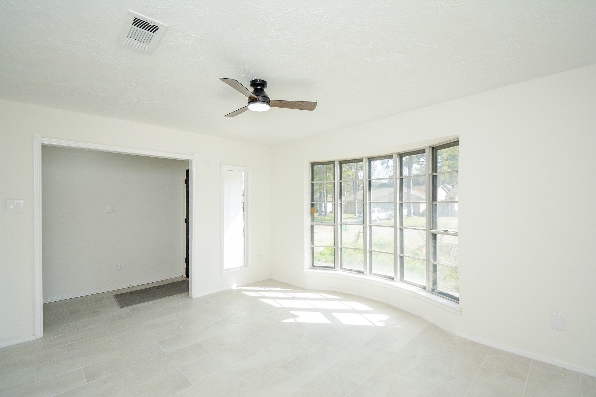4307 Sloangate Drive Spring, TX 77373 - Photo 3 of 22 a view of an empty room with a window