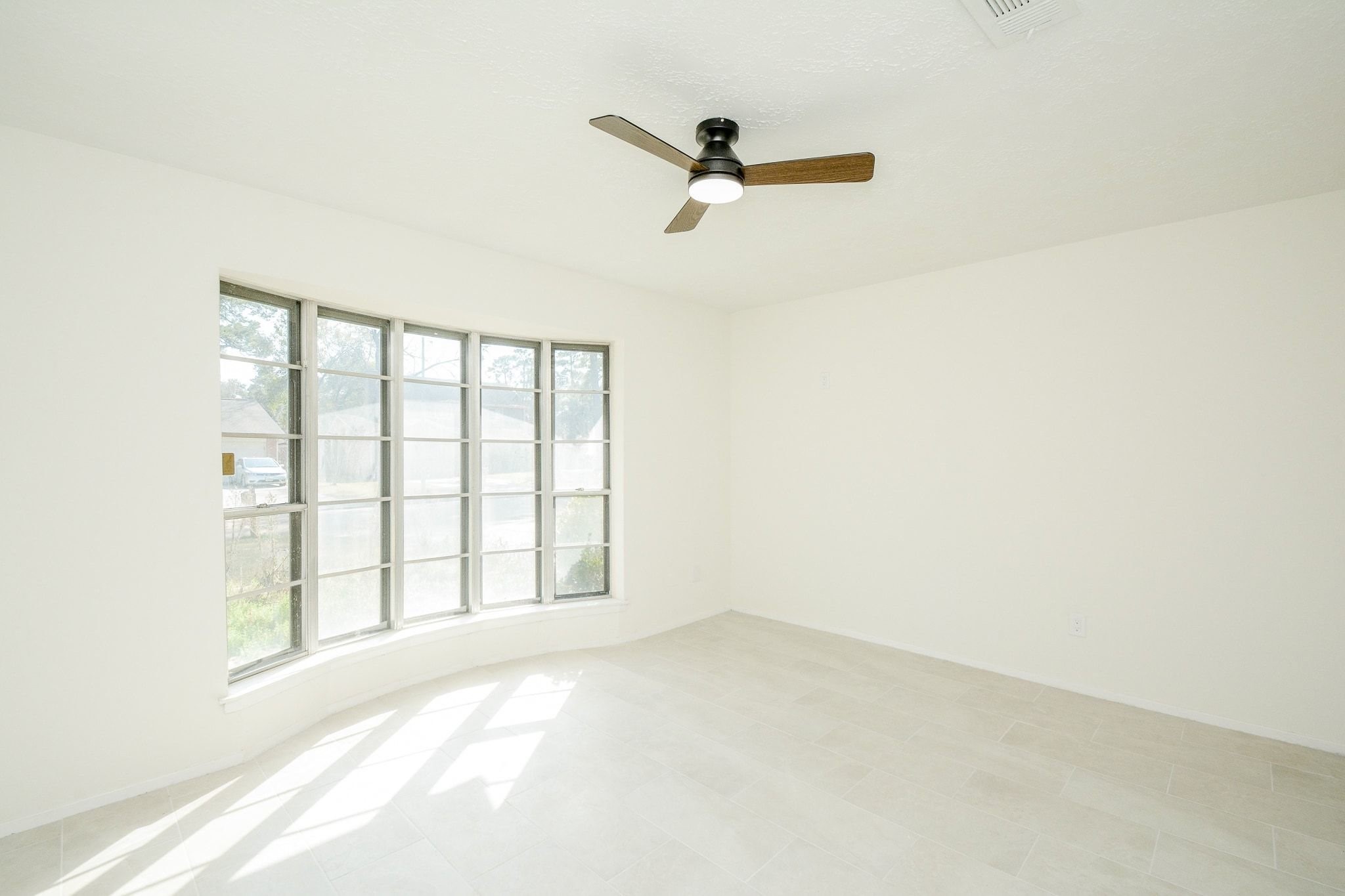 4307 Sloangate Drive Spring, TX 77373 - Photo 4 of 22 a view of an empty room with a window