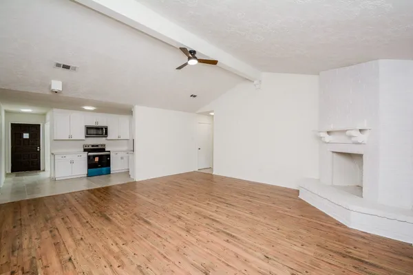 a view of a kitchen with a sink and a kitchen