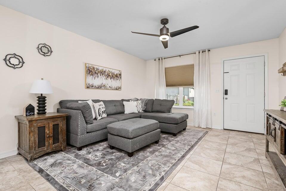 102 Lear Court Crestview, FL 32539 - Photo 14 of 37 a living room with furniture and a window