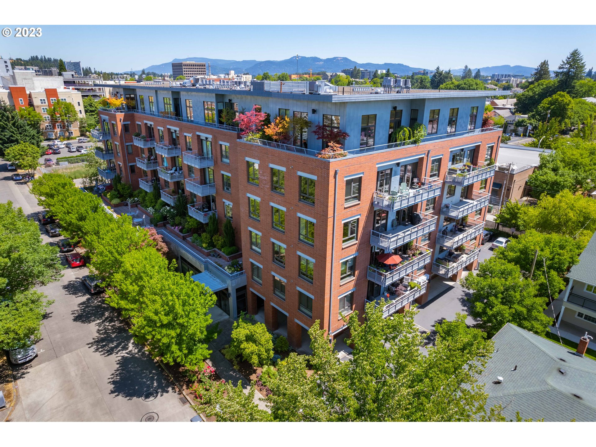a view of a city with tall buildings