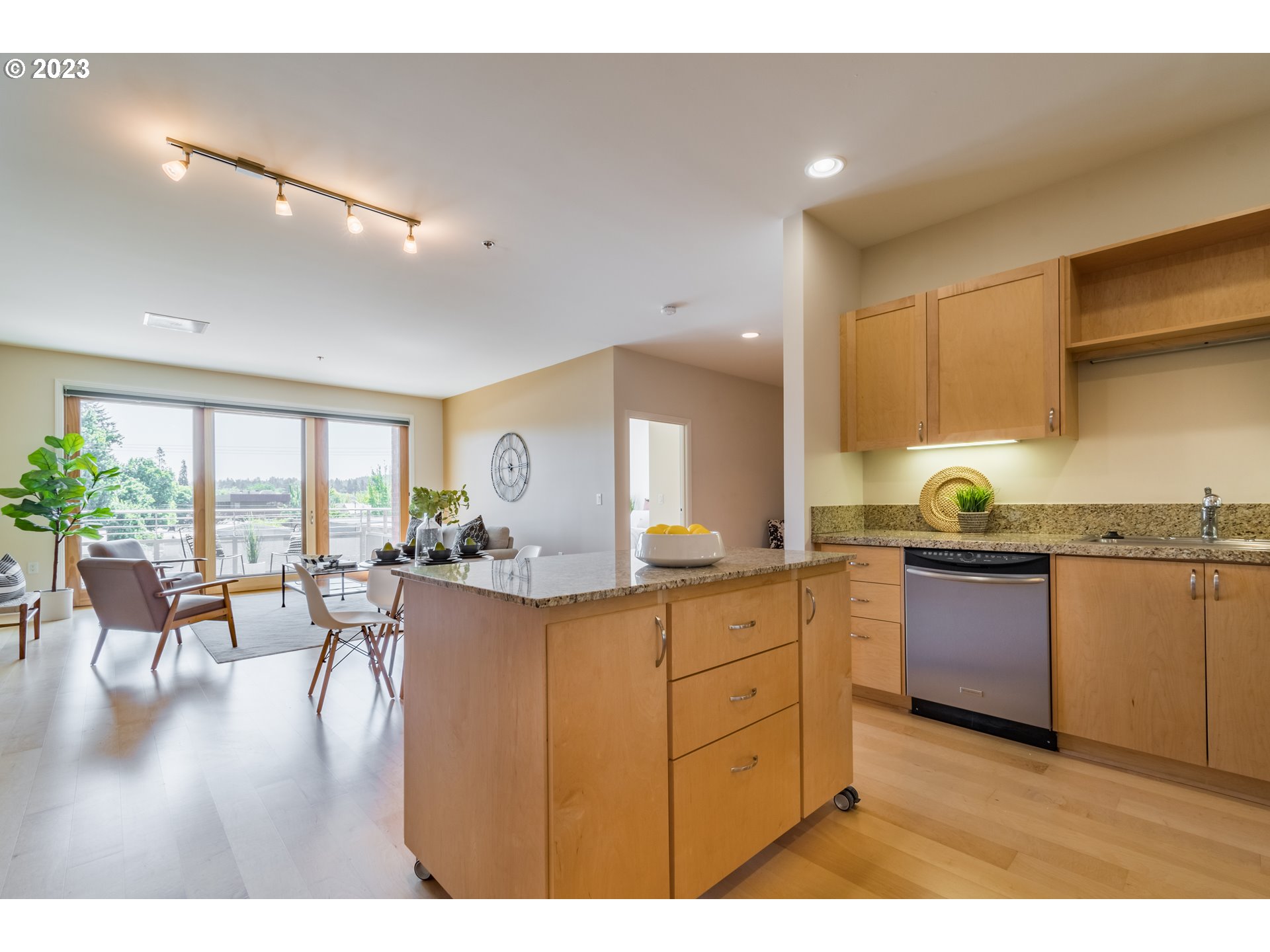 1375 Olive Street, Unit 308 Eugene, OR 97401 - Photo 13 of 35 a kitchen with sink and cabinets