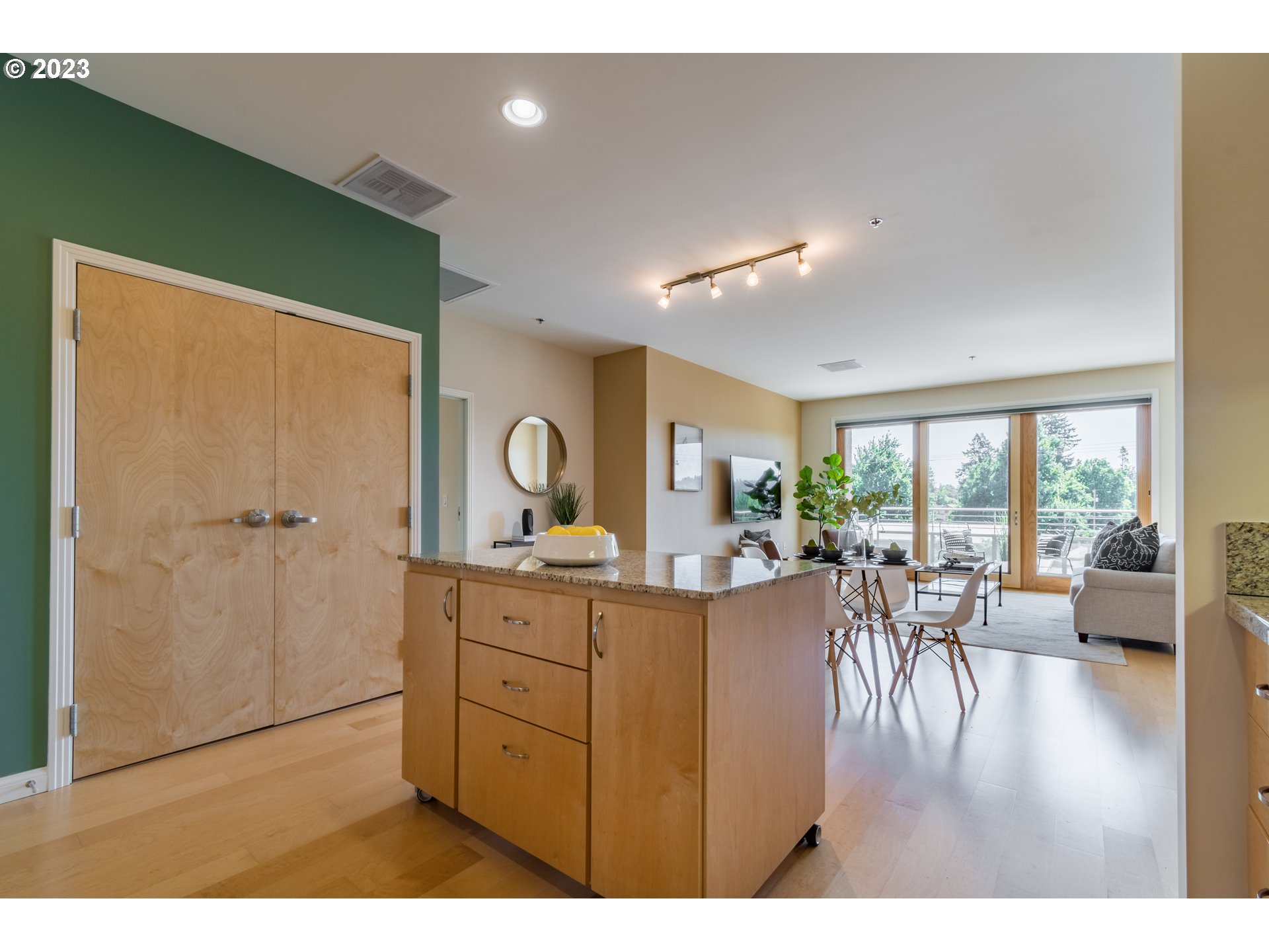 1375 Olive Street, Unit 308 Eugene, OR 97401 - Photo 16 of 35 a living room with furniture a window and appliances
