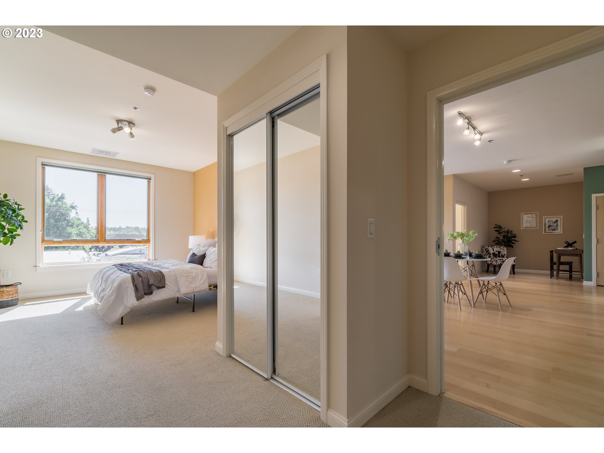 1375 Olive Street, Unit 308 Eugene, OR 97401 - Photo 18 of 35 a living room with furniture and a large window