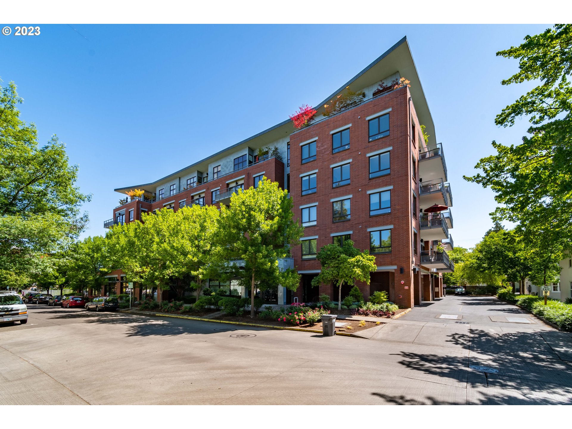 1375 Olive Street, Unit 308 Eugene, OR 97401 - Photo 2 of 35 a view of a tall building next to a road