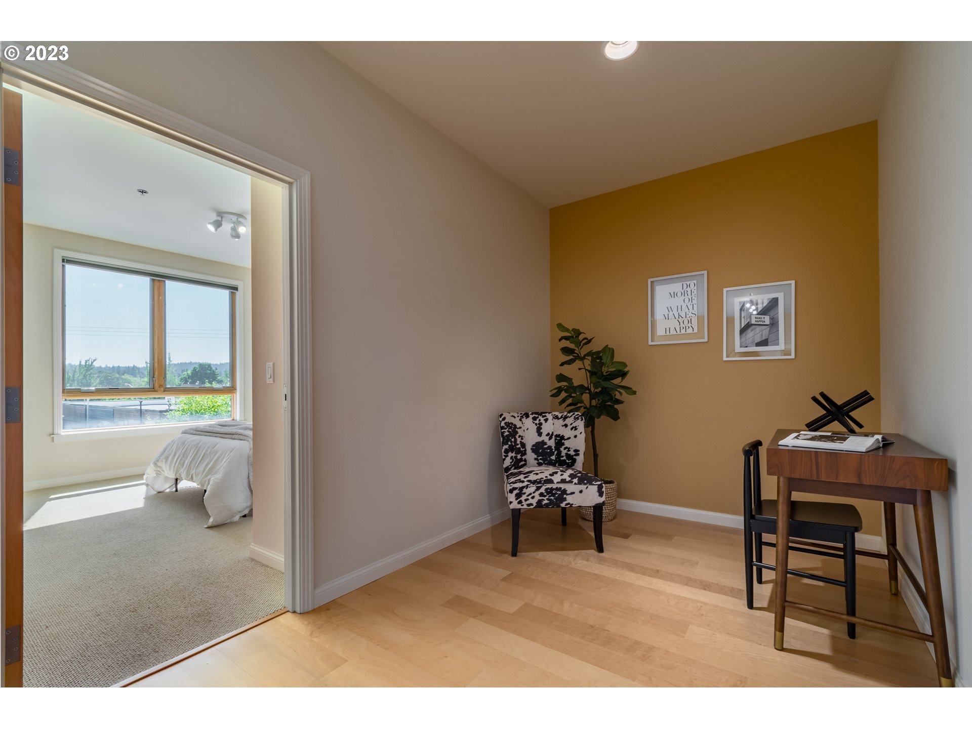 1375 Olive Street, Unit 308 Eugene, OR 97401 - Photo 23 of 35 a living room with furniture and a large window