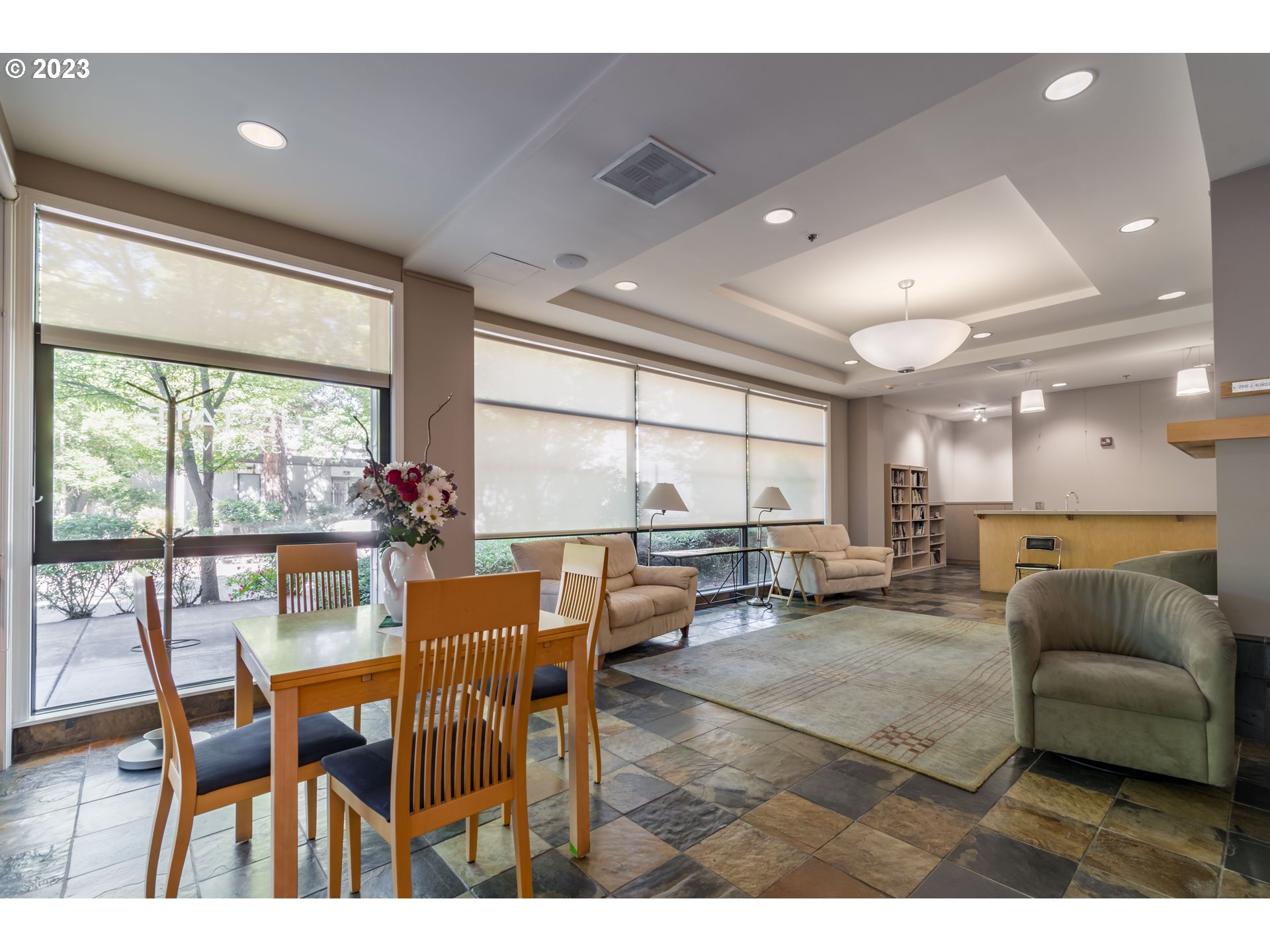 1375 Olive Street, Unit 308 Eugene, OR 97401 - Photo 31 of 35 a view of a dining room with furniture window and outside view