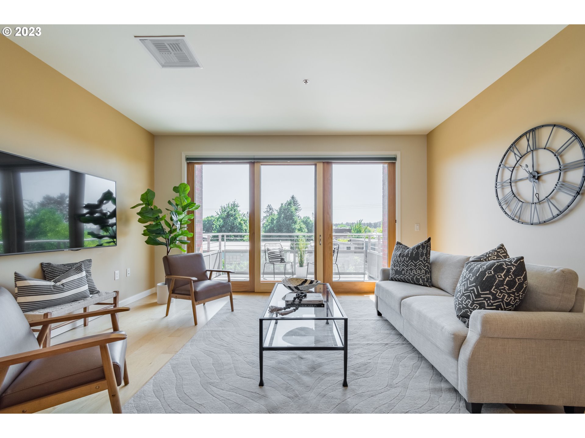 1375 Olive Street, Unit 308 Eugene, OR 97401 - Photo 5 of 35 a living room with furniture and a large window