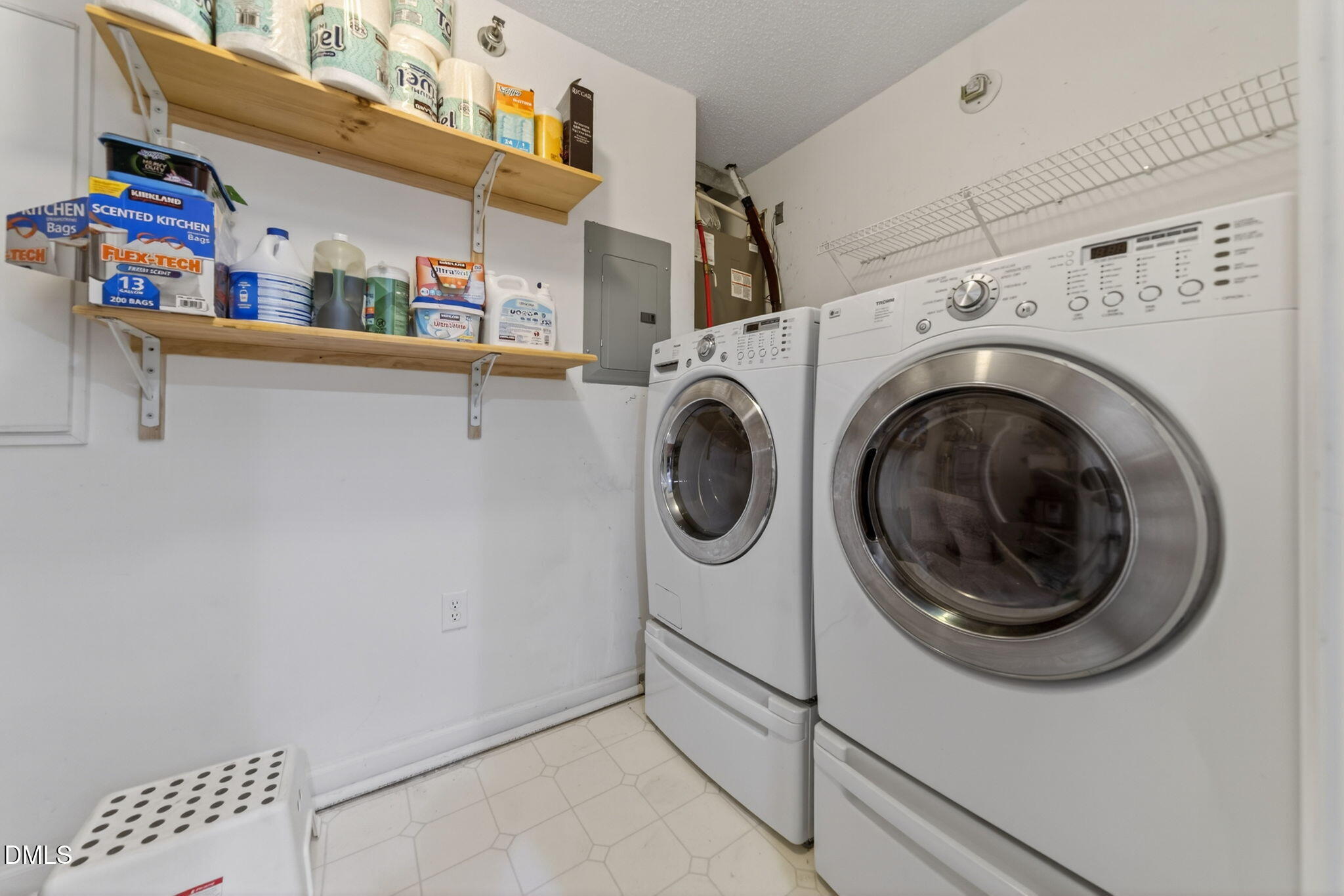 1911 Falls Landing Drive, Unit 203 Raleigh, NC 27614 - Photo 19 of 39 a utility room with dryer and washer