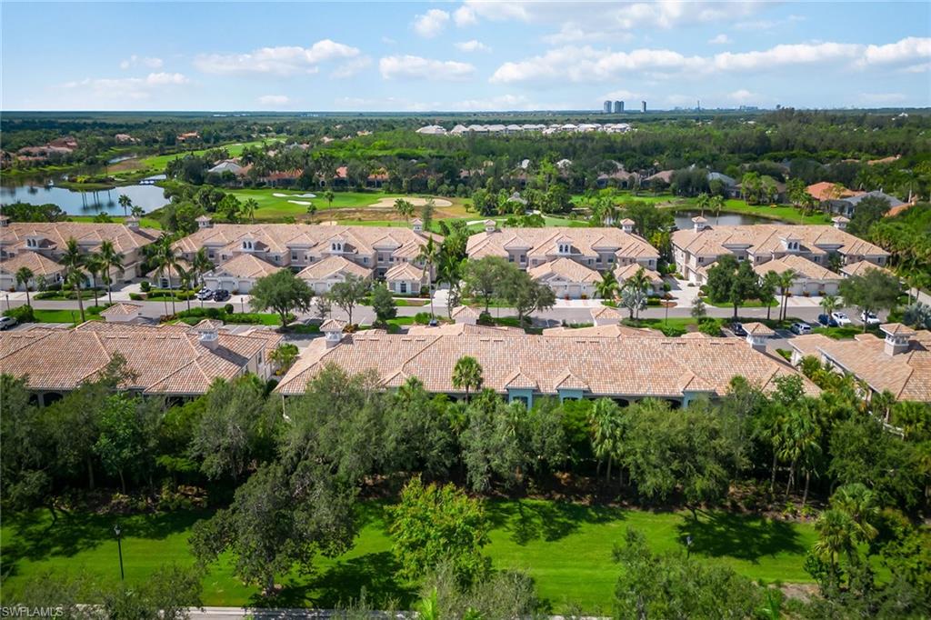 3985 Deer Crossing Court, Unit 103 Naples, FL 34114 - Photo 20 of 37 a view of a city