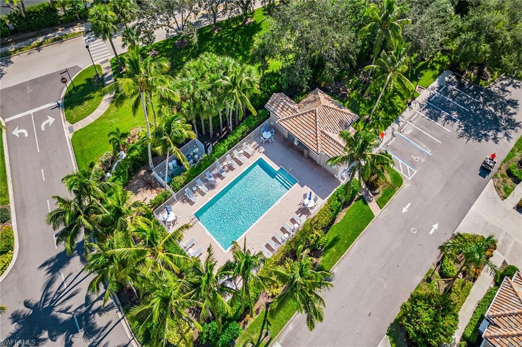 3985 Deer Crossing Court, Unit 103 Naples, FL 34114 - Photo 24 of 37 an aerial view of a house