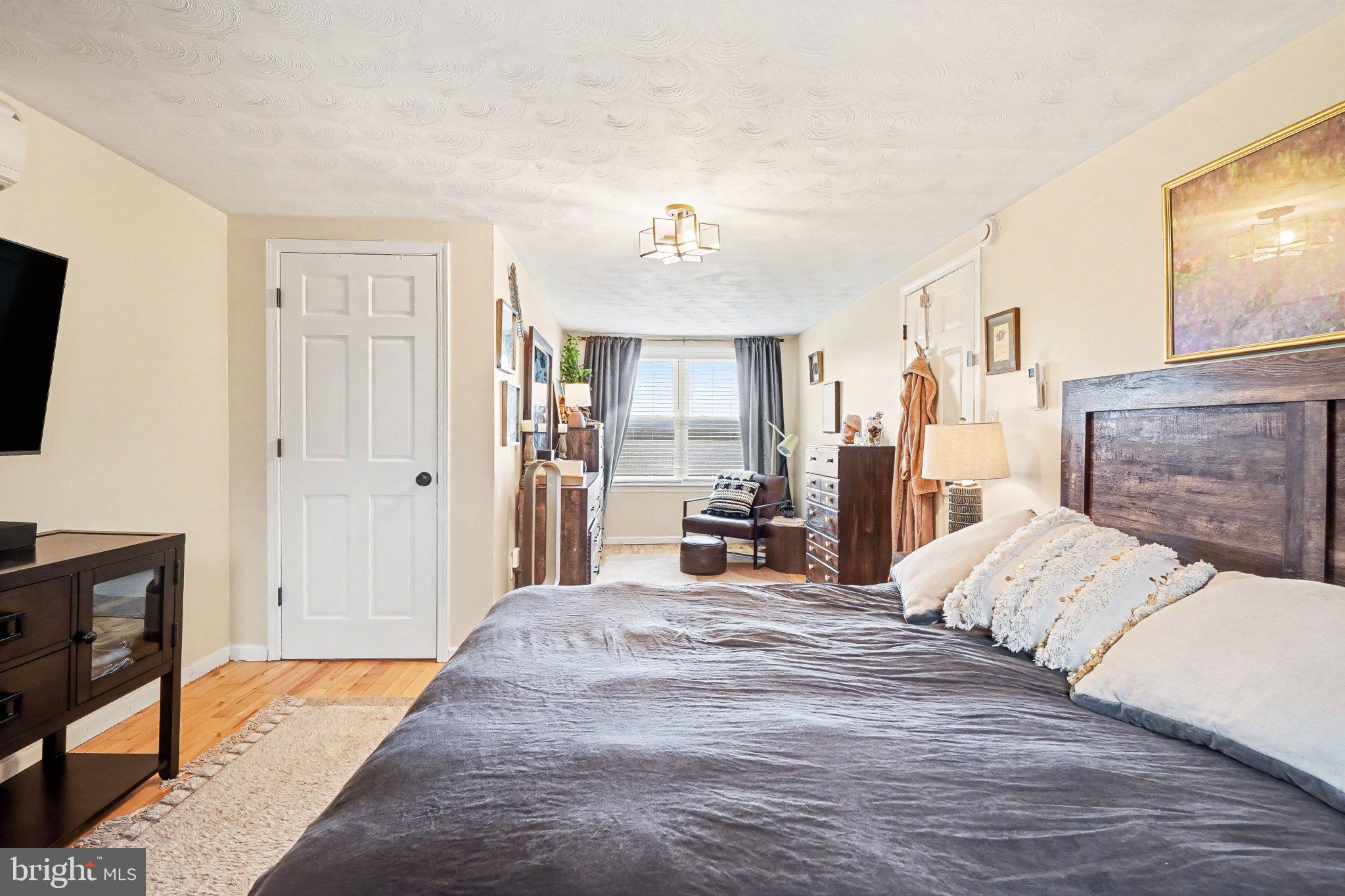 369 Dunkel School Road Halifax, PA 17032 - Photo 17 of 33 a bed room with a bed and a television
