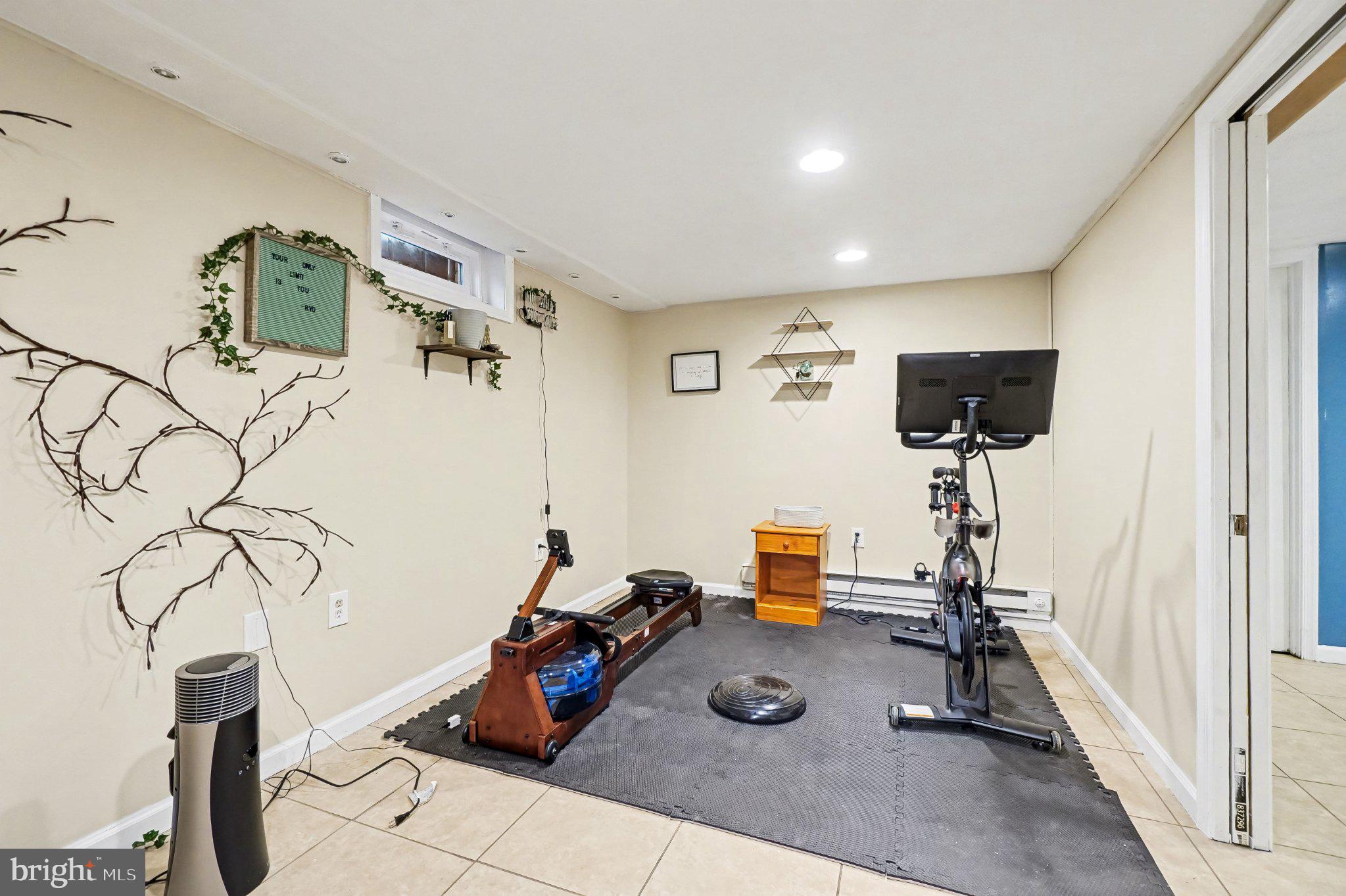 369 Dunkel School Road Halifax, PA 17032 - Photo 21 of 33 Versatile basement workout space.