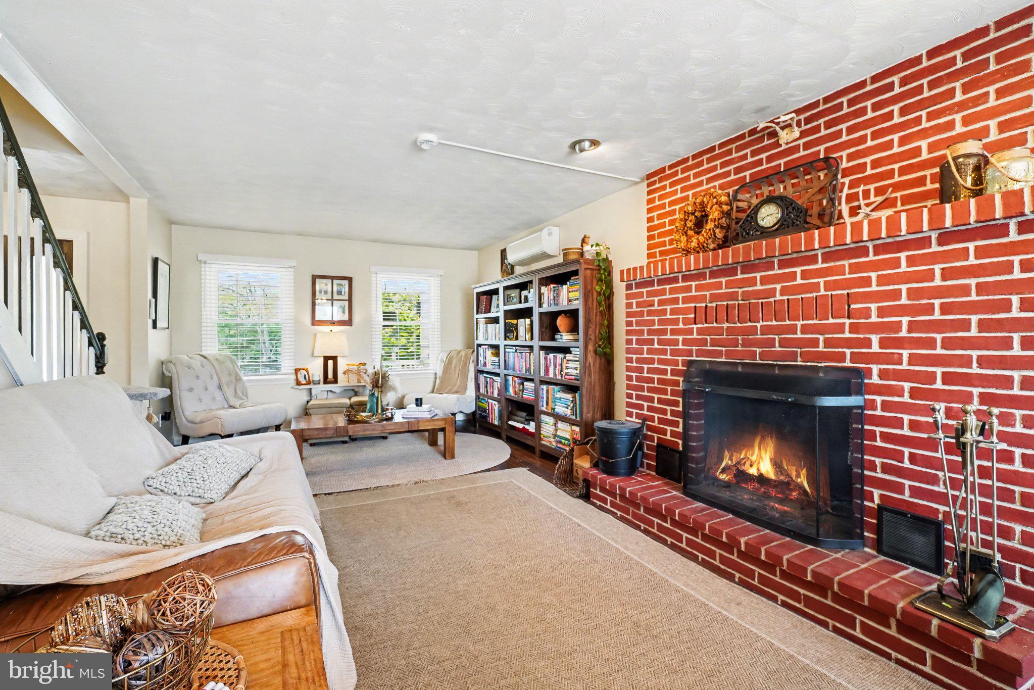 369 Dunkel School Road Halifax, PA 17032 - Photo 7 of 33 Cozy living room with a warm fireplace.