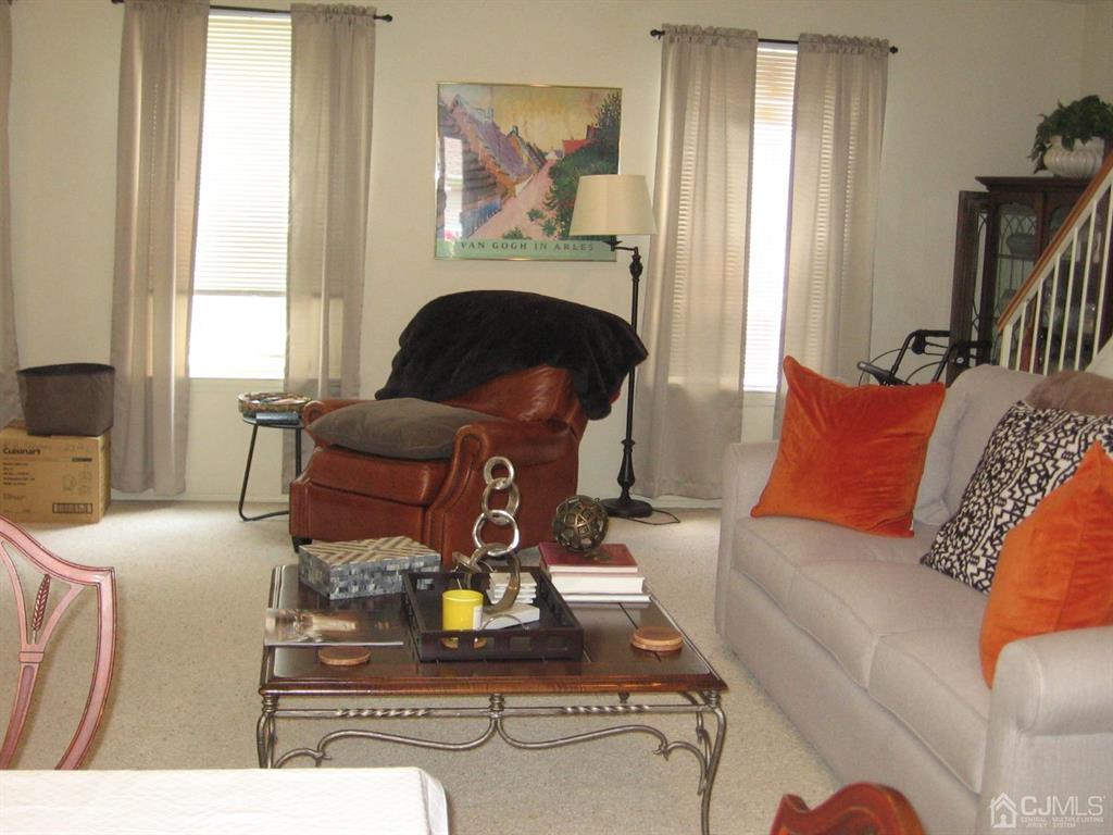 1708 Ridgeview Court Sayreville, NJ 08859 - Photo 11 of 24 a living room with furniture and a fireplace