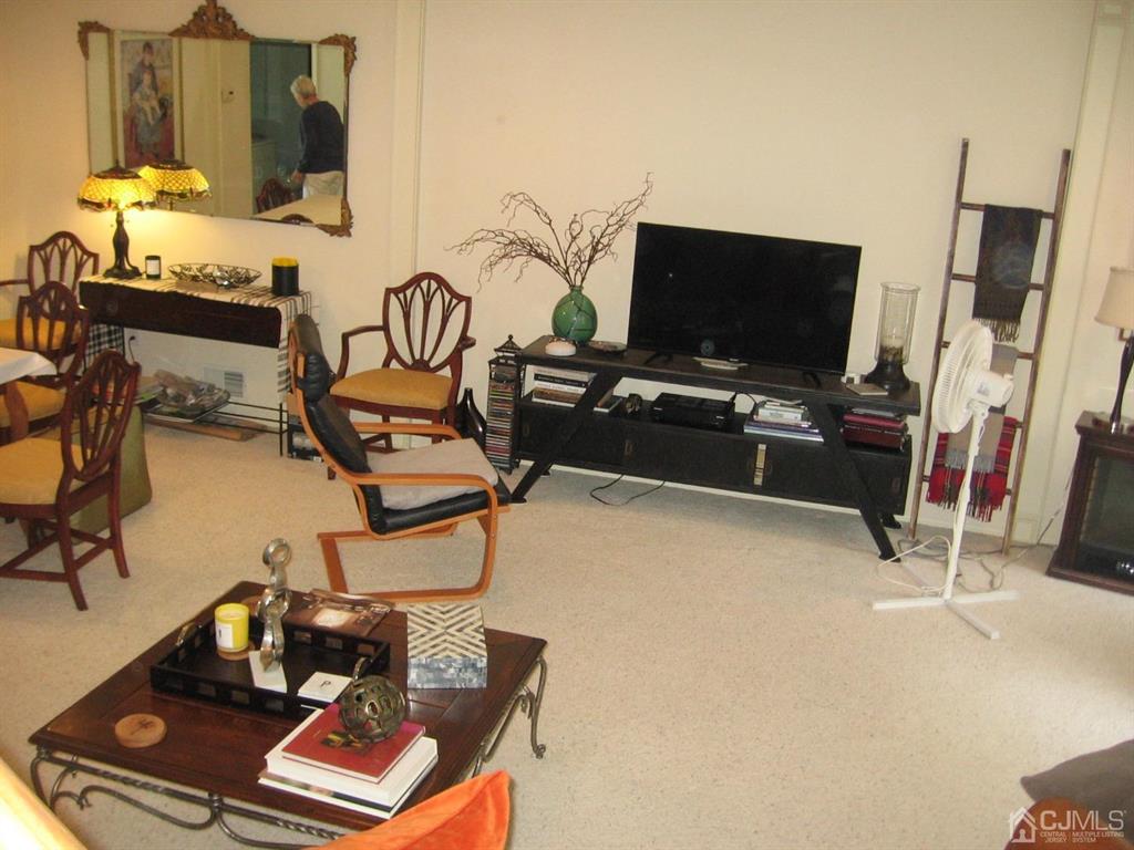 1708 Ridgeview Court Sayreville, NJ 08859 - Photo 6 of 24 a living room with furniture and a flat screen tv