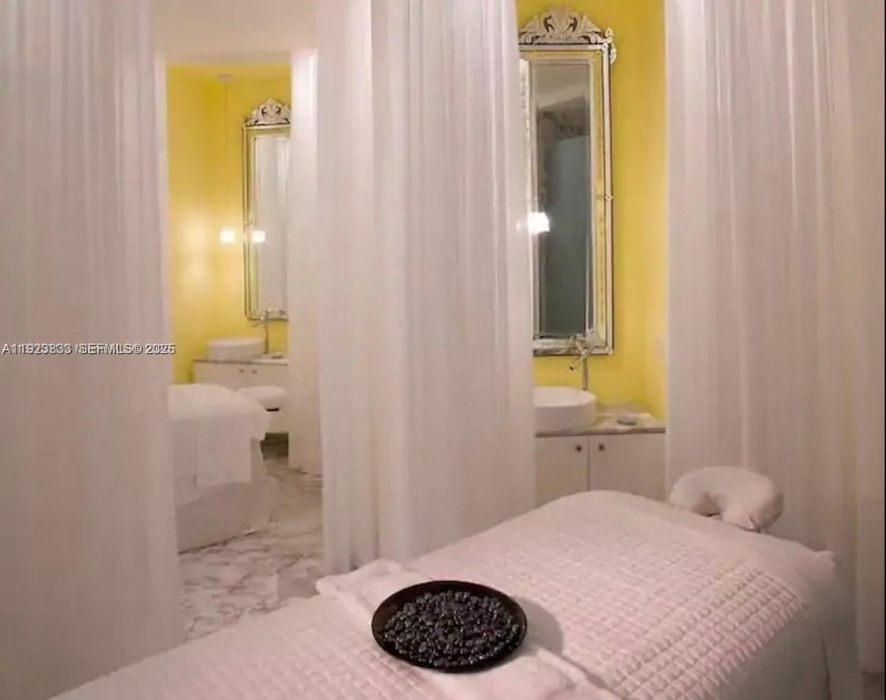 495 Brickell Avenue, Unit 2902 Miami, FL 33131 - Photo 21 of 31 a bathroom with a sink a toilet and shower