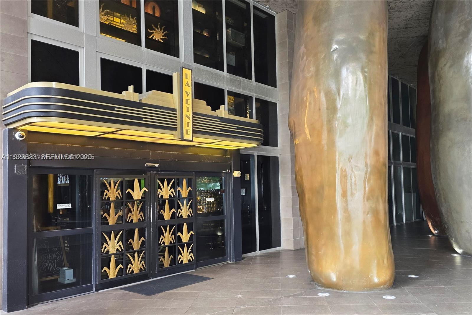 495 Brickell Avenue, Unit 2902 Miami, FL 33131 - Photo 22 of 31 a front view of a building with glass windows