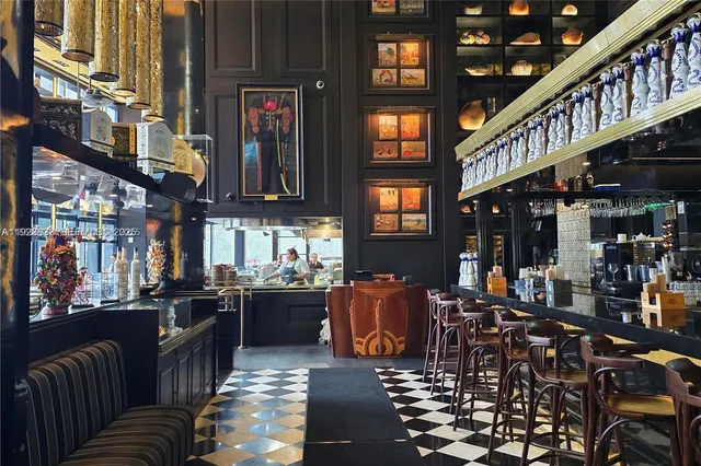 a view of a livingroom with furniture and a chandelier