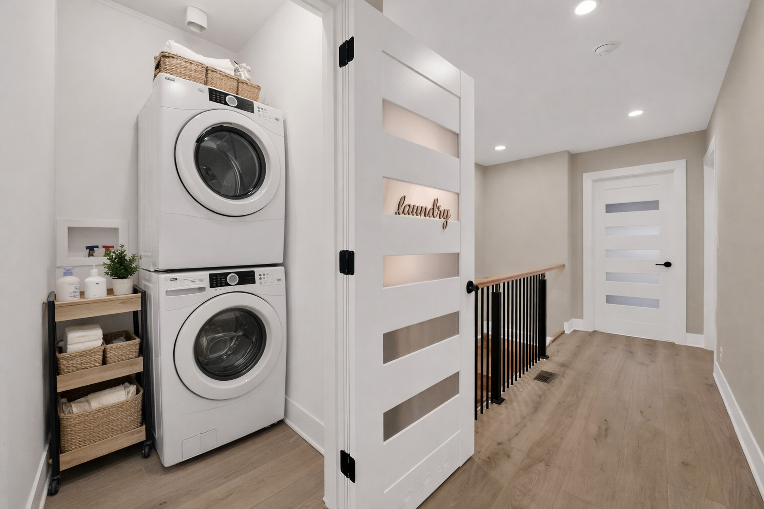 5901 West Erie Street Chicago, IL 60644 - Photo 19 of 38 a view of a hallway with washer and dryer