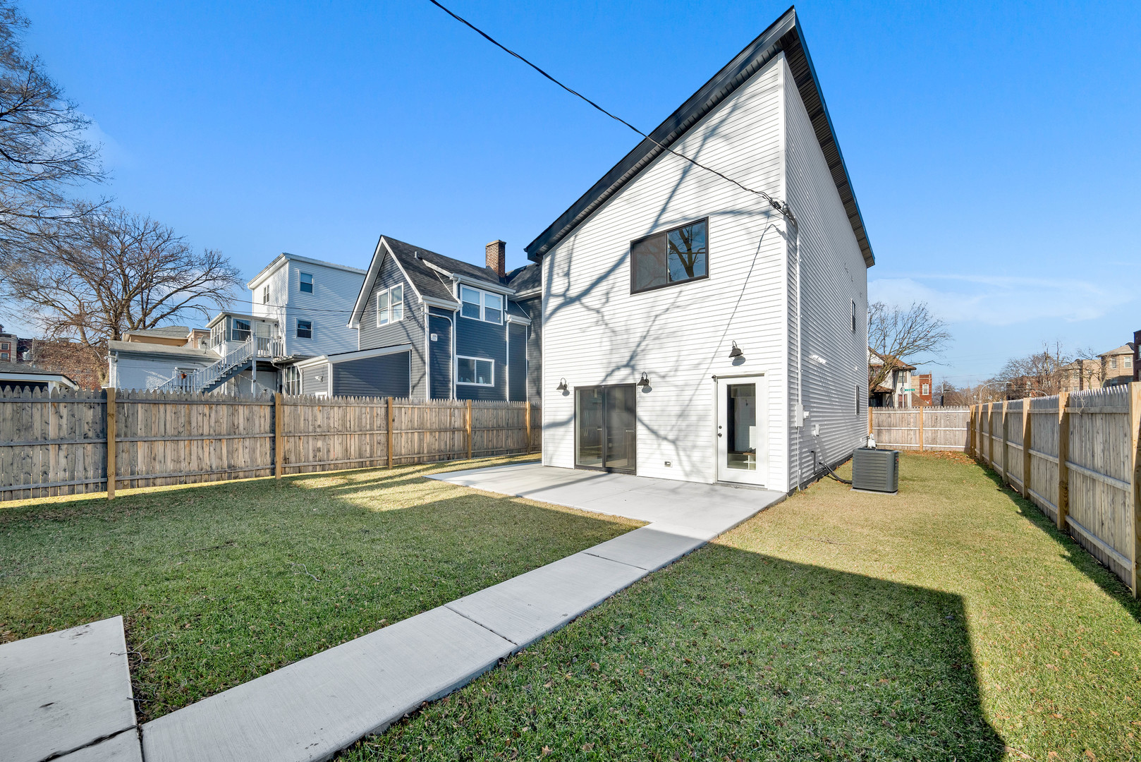 5901 West Erie Street Chicago, IL 60644 - Photo 33 of 38 a view of a house with a yard