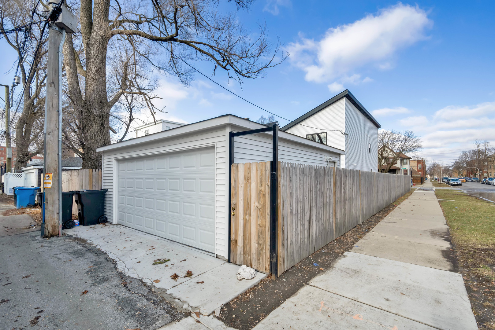 5901 West Erie Street Chicago, IL 60644 - Photo 36 of 38 a view of a house with a snow in the yard