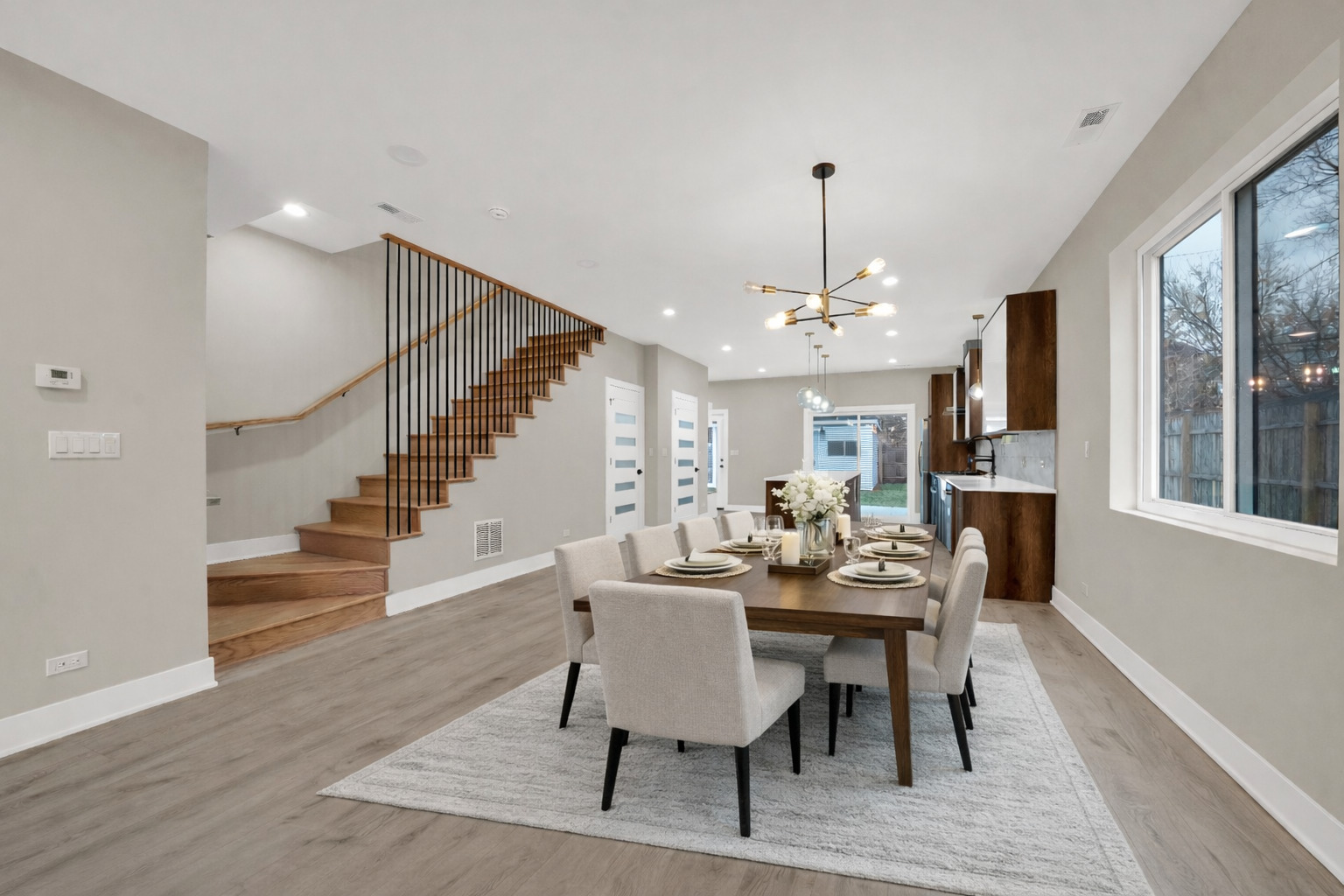 5901 West Erie Street Chicago, IL 60644 - Photo 8 of 38 a view of a dining room with furniture window and wooden floor