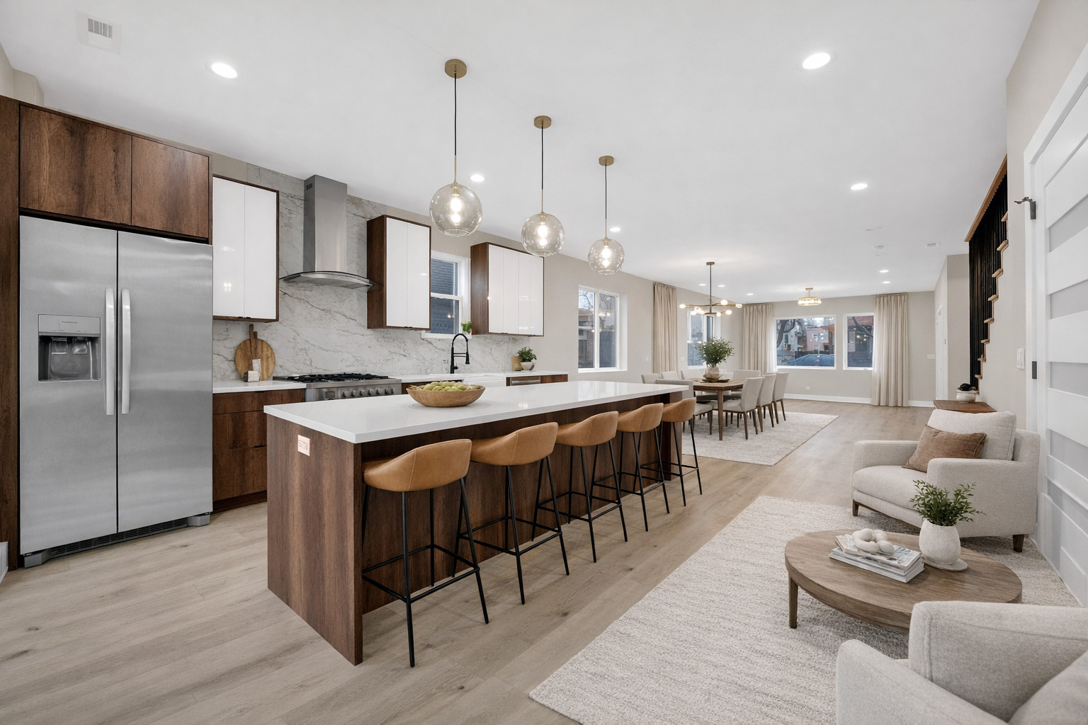 5901 West Erie Street Chicago, IL 60644 - Photo 10 of 38 a large kitchen with a table and chairs