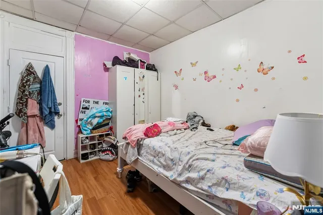 a bed room with a bed and a couch