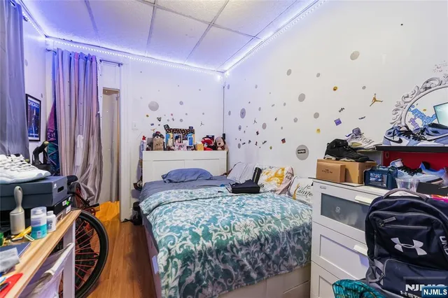 a bedroom with furniture and a bed