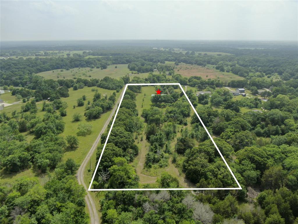 10476 County Road 313 Terrell, TX 75161 - Photo 37 of 40 an aerial view of house with yard