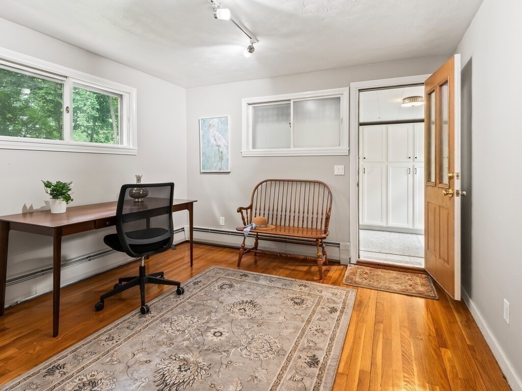 27 Whitla Drive Worcester, MA 01604 - Photo 16 of 38 a living room with a couch and a table