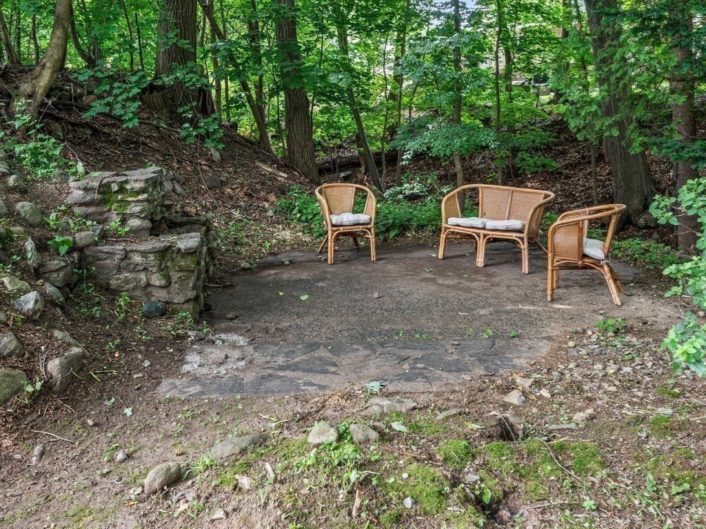 27 Whitla Drive Worcester, MA 01604 - Photo 31 of 38 a couple of lawn chairs sitting in backyard of a house