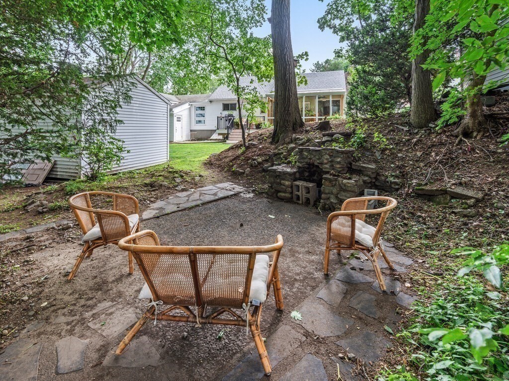 27 Whitla Drive Worcester, MA 01604 - Photo 32 of 38 a view of a chairs and table in backyard