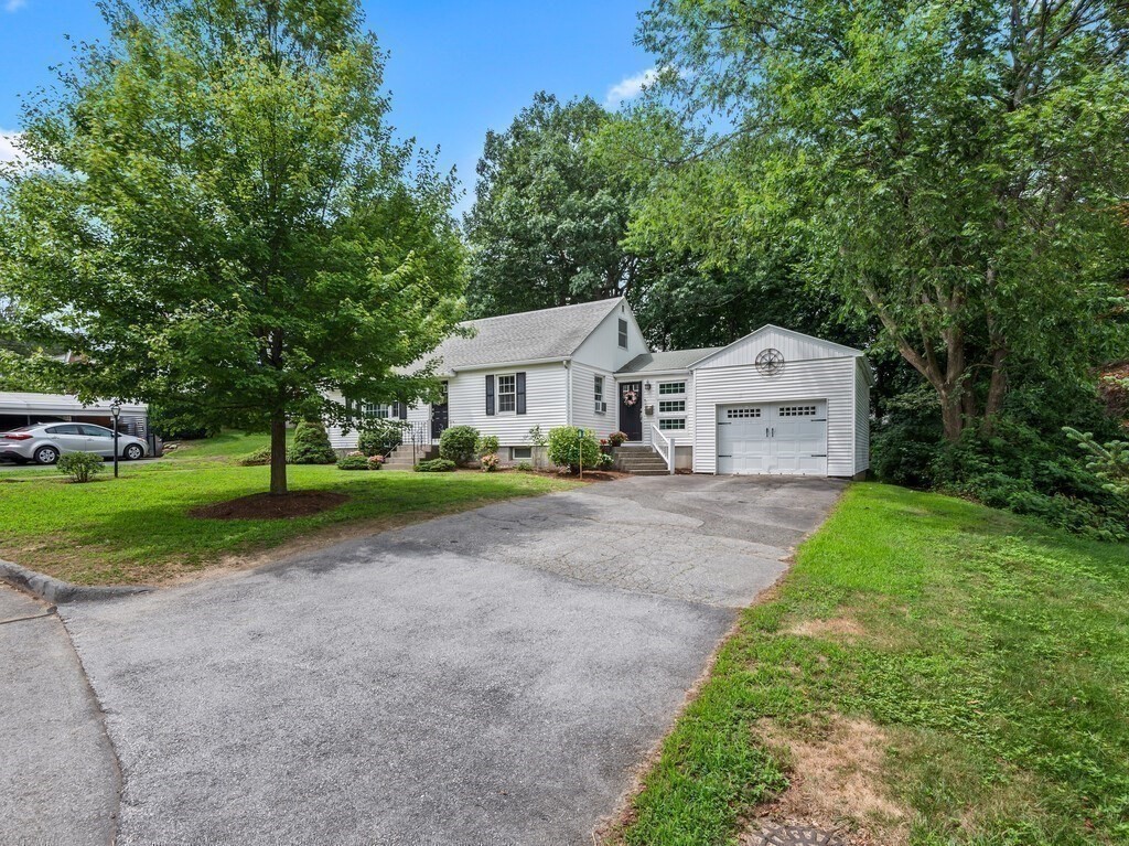 27 Whitla Drive Worcester, MA 01604 - Photo 35 of 38 a front view of a house with yard and green space