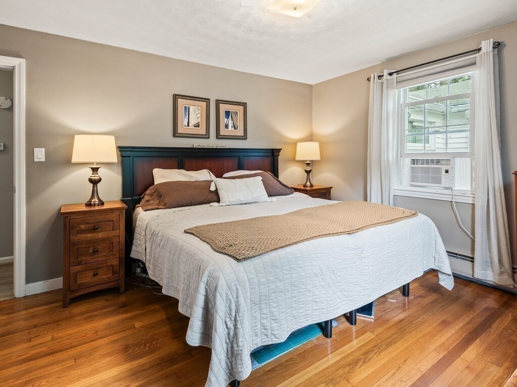 27 Whitla Drive Worcester, MA 01604 - Photo 10 of 38 a bedroom with bed and wooden floor