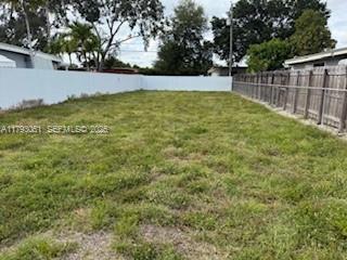 137 West 32nd Street Hialeah, FL 33012 - Photo 2 of 5 a view of backyard with swimming pool and seating space
