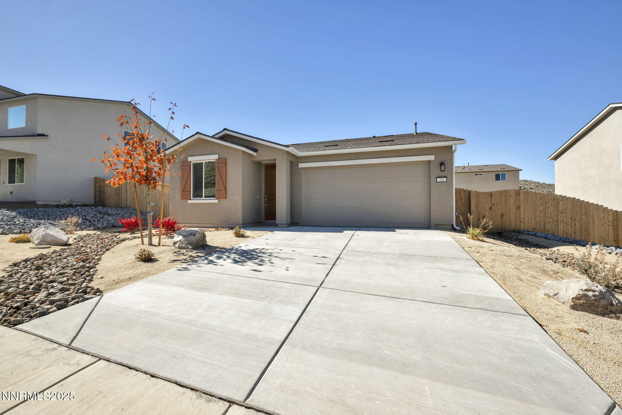 700 Kess Way Reno, NV 89506 - Photo 2 of 53 a front view of a house with a tub