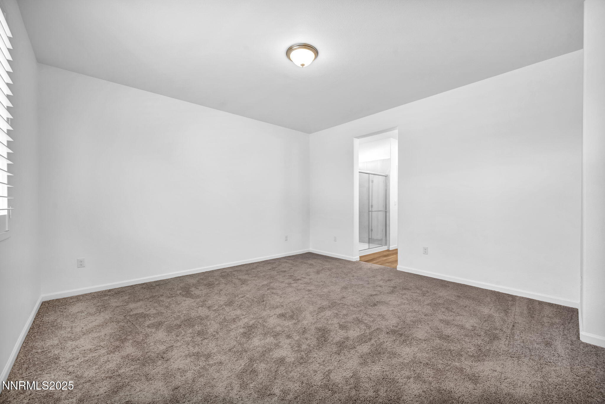 700 Kess Way Reno, NV 89506 - Photo 30 of 53 an empty room with windows