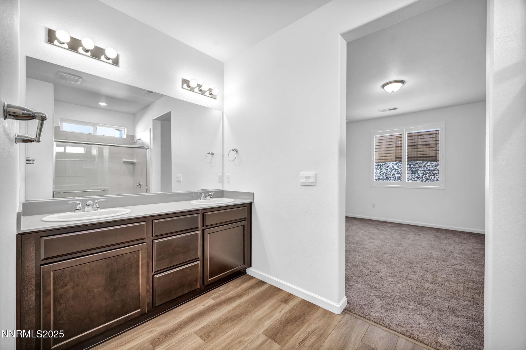 700 Kess Way Reno, NV 89506 - Photo 35 of 53 a spacious bathroom with a granite countertop sink