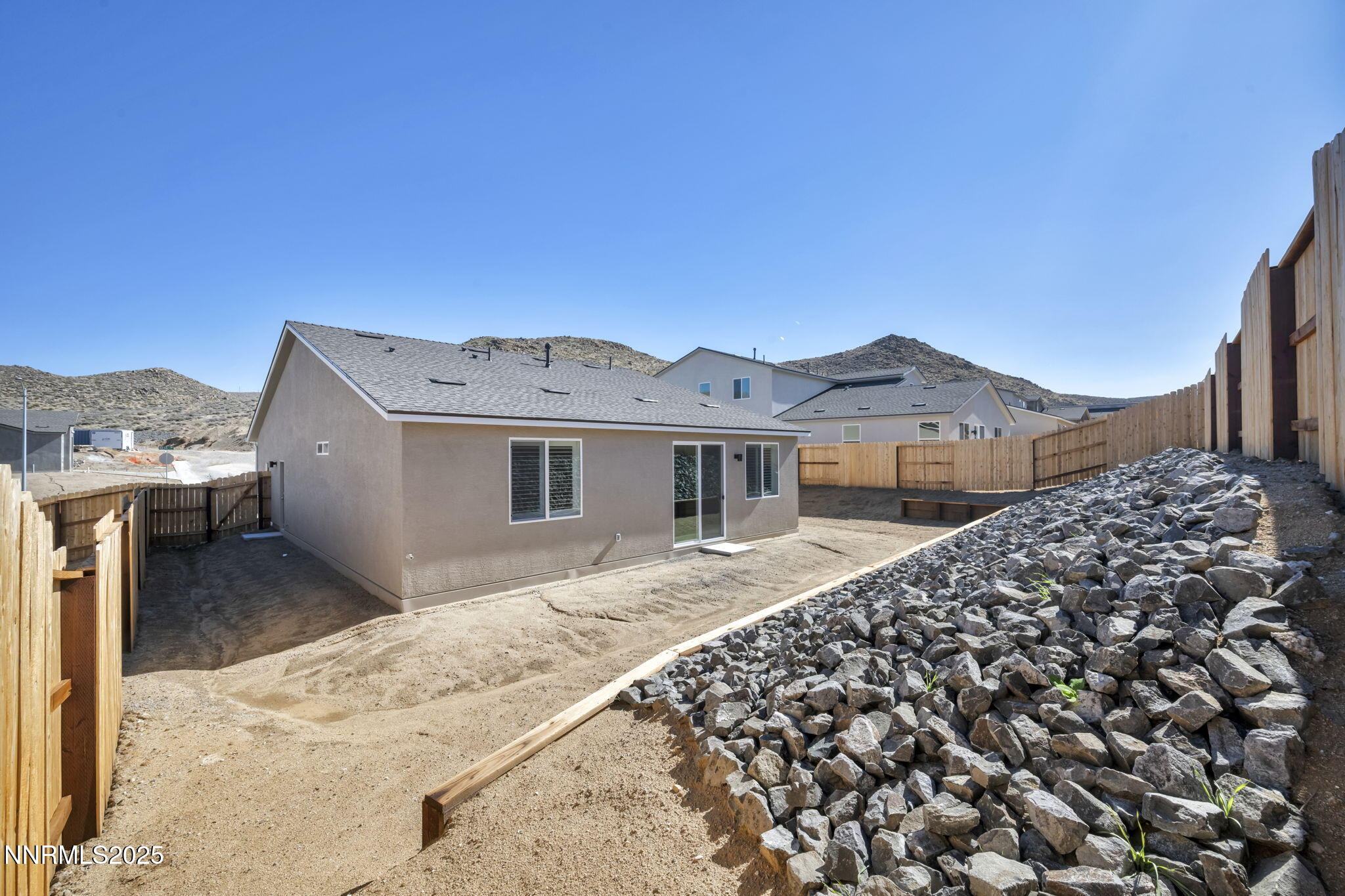 700 Kess Way Reno, NV 89506 - Photo 8 of 53 a view of a house with a snow in the background