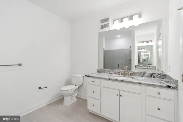 a view of a hallway with washer and dryer