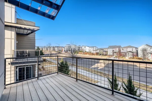 a view of balcony with furniture