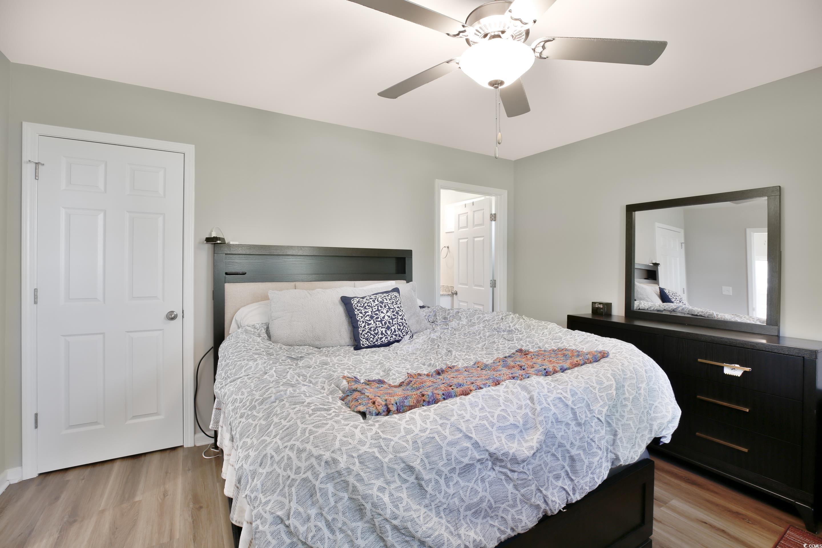 168 Rosedale Drive Aynor, SC 29511 - Photo 20 of 20 Bedroom featuring wood finished floors and ceiling