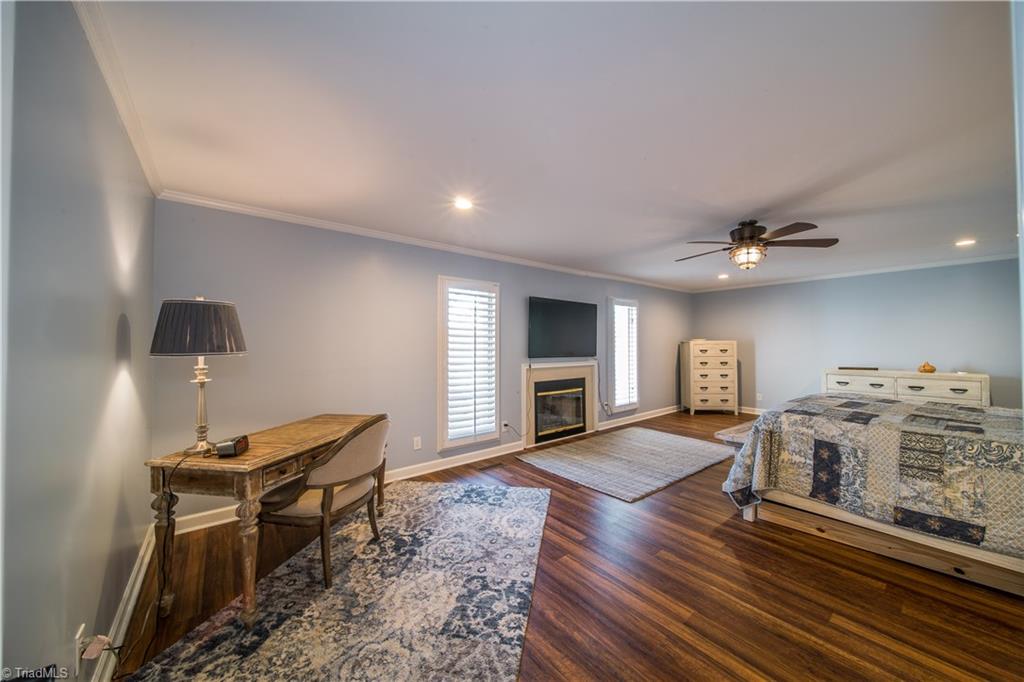 262 Lakeview Road Mocksville, NC 27028 - Photo 14 of 30 Large Master includes Gas Log Fireplace and 60 inch TV. Also amazing custom built His and Hers Closet. See Master Bath with separate Shower and Jetted Tub.