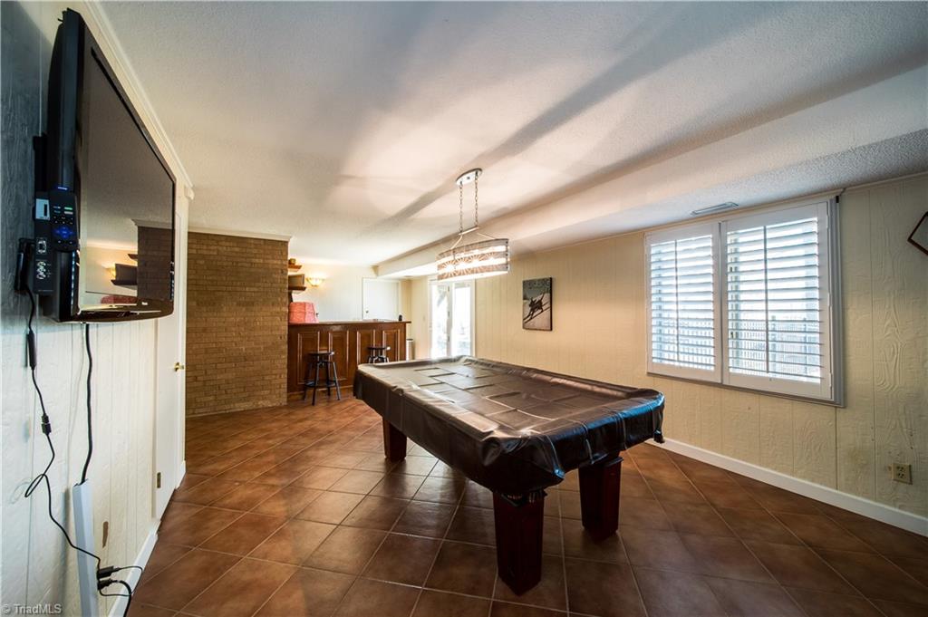 262 Lakeview Road Mocksville, NC 27028 - Photo 22 of 30 Game Room includes Pool Table with Wet Bar and 2 TVs.