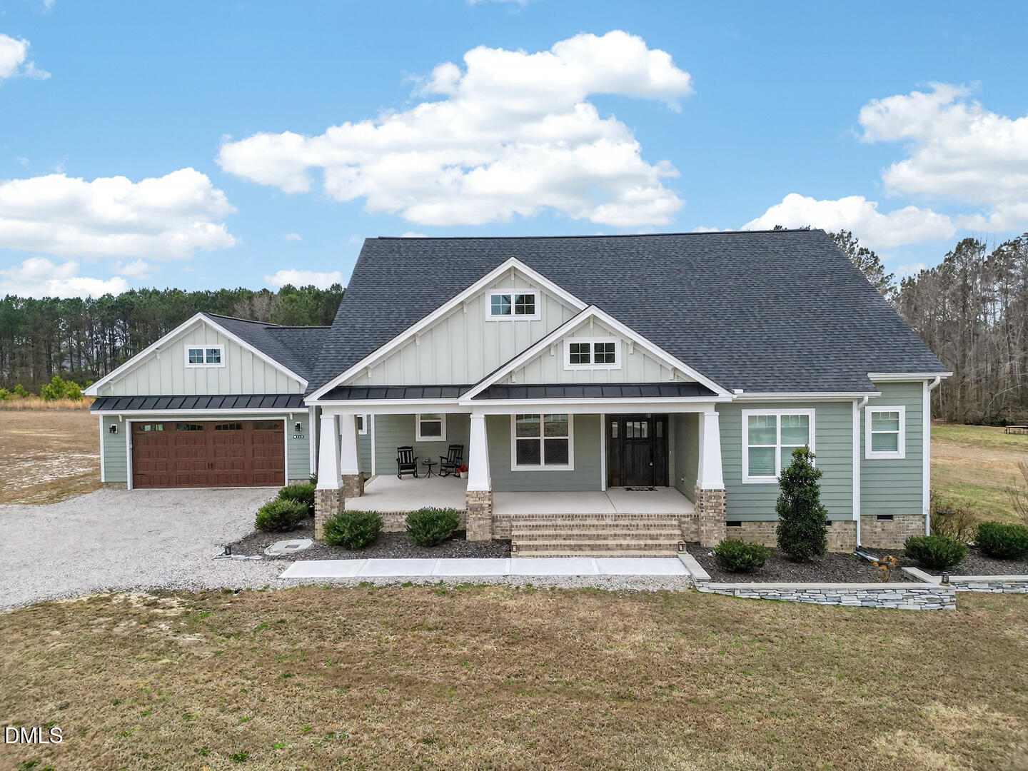 540 Pine Ridge Road Zebulon, NC 27597 - Photo 1 of 96 a front view of a house with a yard