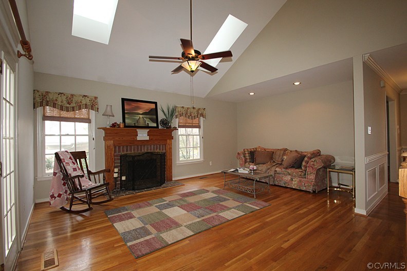 5708 Sandstone Ridge Terrace Midlothian, VA 23112 - Photo 10 of 23 a living room with furniture and a fireplace
